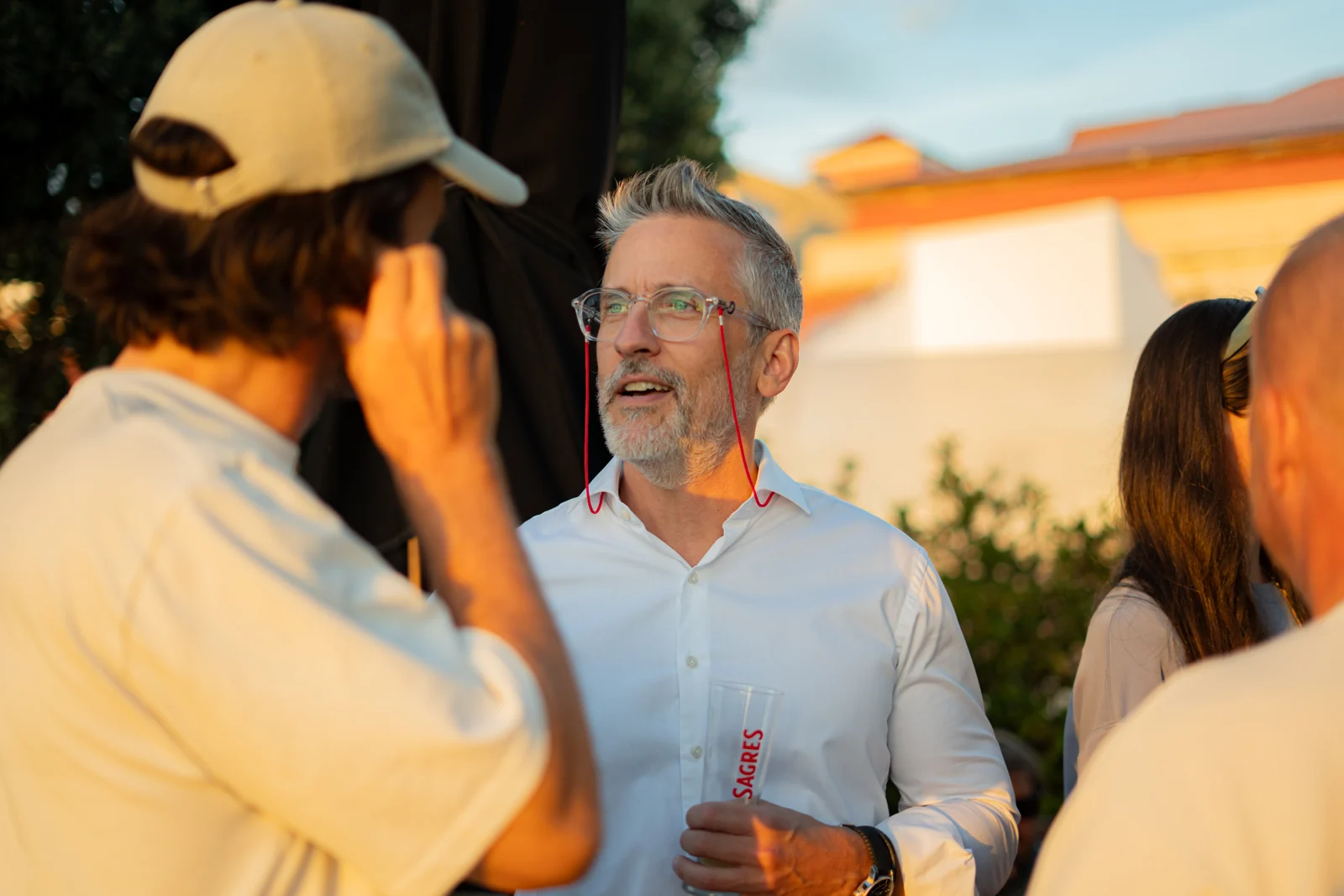 Two people in conversation at an Onfound rooftop event